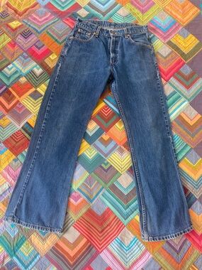 Vintage Levi’s 511 flare medium blue Jeans. 30x30.